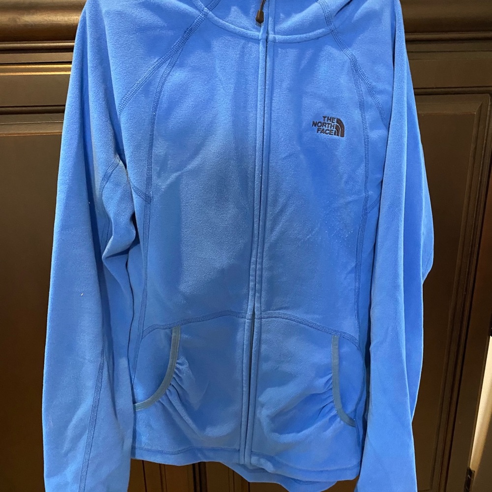 Blue north face zip up